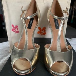 Gold high heels
